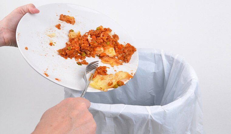 Businesses say no to food waste plate food waste bin throwing away food shut e1649402294868
